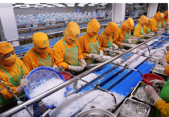 Năng suất lao động thấp là một thách thức với Việt Nam trong hội nhập. Ảnh: Tất Tiên