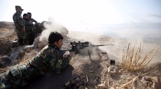 Các tay súng người Kurd tham gia chiến dịch giải phóng Mosul (Ảnh: Reuters)