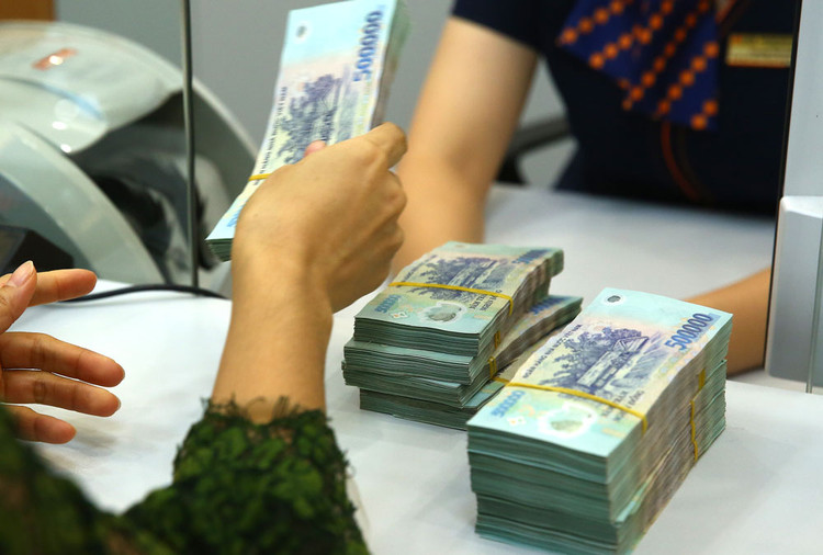 Các công cụ chính sách đồng bộ đã giúp lạm phát luôn được kiểm soát ở mức thấp, mặc dù lượng tiền bơm ra nền kinh tế rất lớn. Ảnh: Nhã Chi