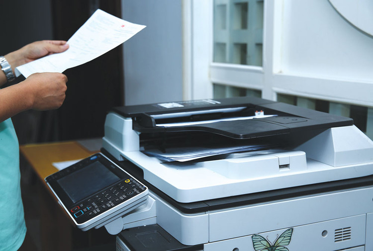 Tỷ lệ giảm giá qua đấu thầu của Công ty TNHH SN TG chuyên cung cấp máy tính, máy photocopy… thường rất thấp. Ảnh: Nhã Chi