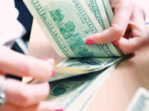 Giá USD hôm nay 26/3 tăng mạnh. Ảnh minh họa: TTXVN