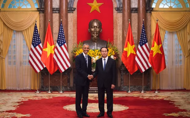 Chủ tịch nước Trần Đại Quang và Tổng thống Barack Obama - Ảnh: Reuters.
