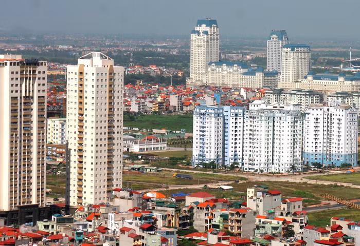 Nghị quyết về phân loại đô thị và Nghị quyết về tiêu chuẩn và phân loại đơn vị hành chính đều đưa ra tiêu chí trình độ phát triển kinh tế - xã hội. Ảnh: Tiên Giang