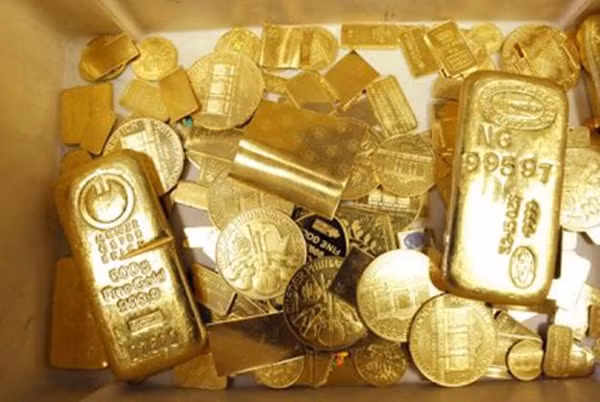 Giá vàng được dự báo sẽ tăng trở lại mốc 1.400 USD trong năm 2017. Ảnh:AFP.