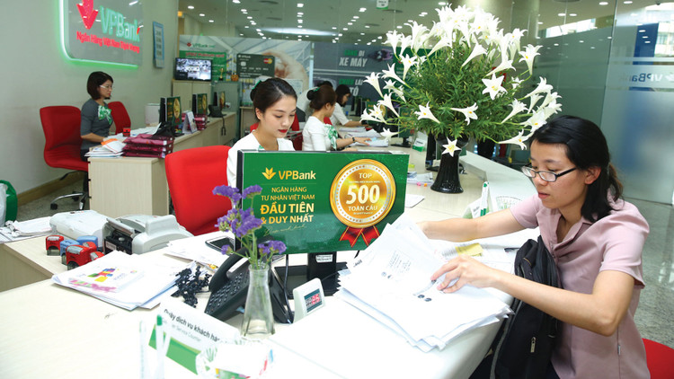 Đến cuối năm 2018, dư nợ tín dụng cho khu vực doanh nghiệp nhỏ và vừa đạt 1.307.000 tỷ đồng, chiếm 18% tổng dư nợ tín dụng. Ảnh: Lê Tiên