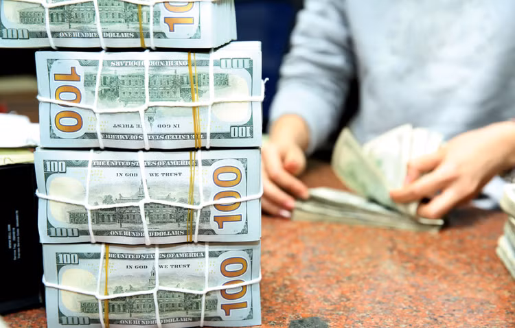 Tác động từ quyết định giảm lãi suất của Cục Dự trữ liên bang Mỹ tới tỷ giá USD/VND được dự báo sẽ không lớn. Ảnh: Lê Tiên