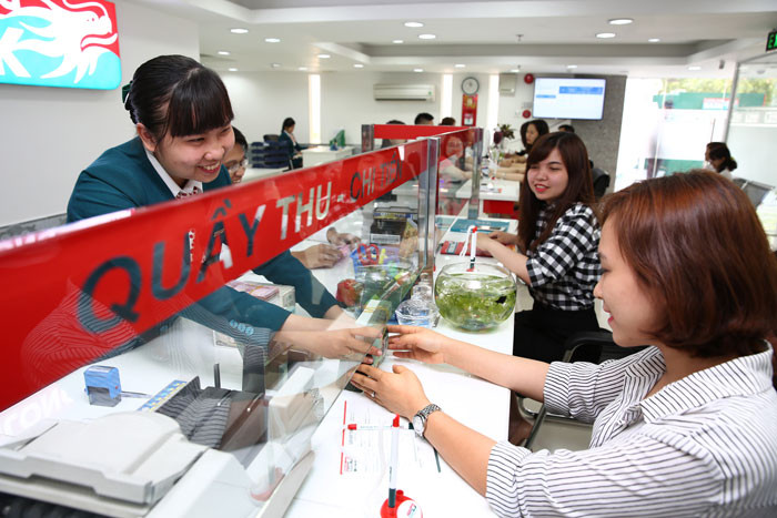 Năm 2016, ngân sách phải dành ra 150.000 tỷ đồng để trả nợ. Ảnh: Tiên Giang