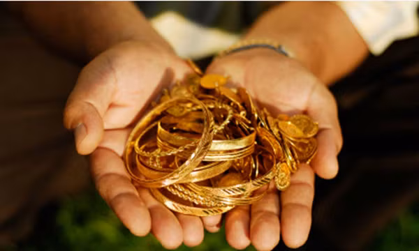 Giá vàng chịu áp lực giảm.