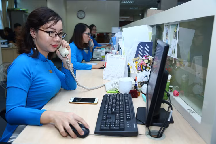 Chấn chỉnh việc giải quyết thủ tục hành chính để hạn chế tối đa việc người dân, doanh nghiệp phải đi lại nhiều lần. Ảnh: Nhã Chi