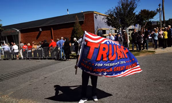 Người ủng hộ ông Trump đến dự một cuộc vận động tranh cử ở thành phố Charlotte, bang Bắc Carolina. Ảnh: New York Times