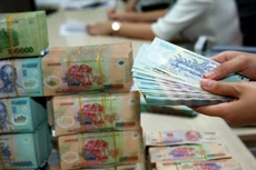 Dự thảo Nghị định hướng dẫn thi hành Luật Phí và lệ phí bỏ quy định về các nội dung chi từ số tiền phí để lại cho tổ chức thu phí là cơ quan nhà nước. Ảnh: Nhã Chi