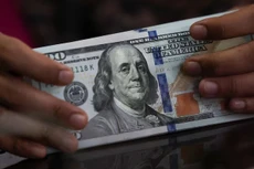 Đồng USD suy giảm trước thềm cuộc họp của Fed