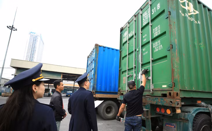 Cải cách về thể chế, cải thiện môi trường kinh doanh là một động lực để nền kinh tế bứt phá. Ảnh: Nhã Chi