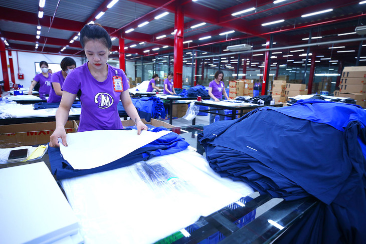 Doanh nghiệp dệt may đang gặp một số thách thức về quy hoạch chuyên ngành, nguồn vốn cho tăng trưởng xanh và chi phí logistics. Ảnh: Tiên Giang
