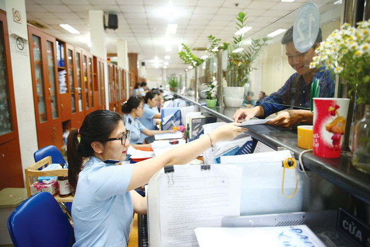 Đẩy mạnh cải cách thể chế, cải thiện môi trường kinh doanh, giảm chi phí cho doanh nghiệp là những giải pháp hiệu quả để tạo động lực tăng trưởng cho nền kinh tế. Ảnh: Lê Tiên