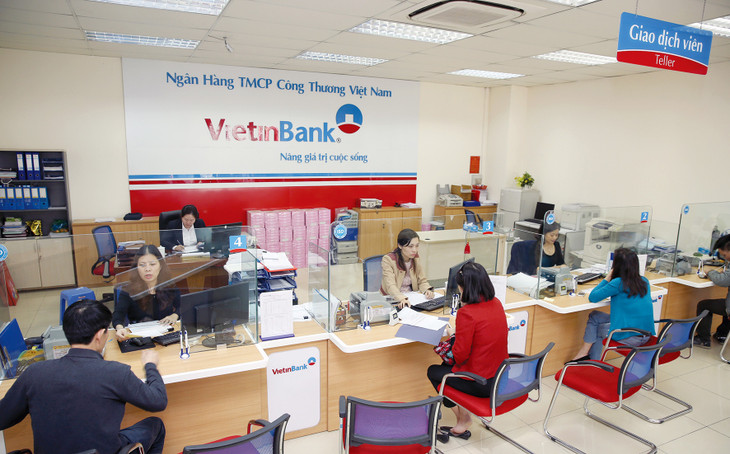 Việc nới lỏng các điều kiện tín dụng có thể đẩy nợ xấu tăng cao, ảnh hưởng an toàn hệ thống ngân hàng. Ảnh: Nhã Chi