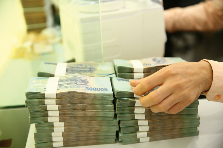 Để thúc đẩy tăng trưởng, cần gỡ thế “vòng quanh” của dòng tiền lớn, chảy giữa Kho bạc Nhà nước với hệ thống ngân hàng. Ảnh: Tiên Giang