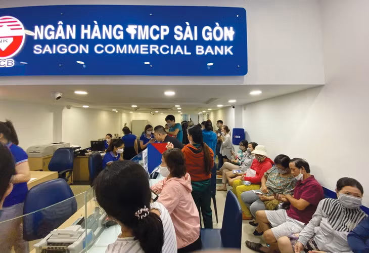 Dự thảo Luật Các tổ chức tín dụng (sửa đổi) quy định cổ đông sở hữu cổ phần trên 1% của một ngân hàng phải công bố công khai các thông tin để thực hiện giám sát. Ảnh: Thiên Nam