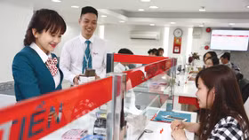 Nhiều ngân hàng có tỷ trọng tín dụng kinh doanh bất động sản và xây dựng ở mức cao. Ảnh: Phúc An