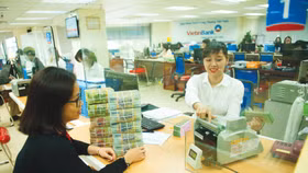 Ngân hàng Nhà nước định hướng kiểm soát an toàn hệ thống bằng các chỉ số phản ánh sức khỏe của từng ngân hàng như chất lượng tài sản, nguồn vốn và khả năng thanh khoản. Ảnh: Nhã Chi