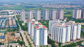 Việc khơi thông các dự án đang “đắp chiếu” giúp người dân có thêm cơ hội sở hữu nhà ở và Nhà nước có thêm quỹ nhà phục vụ các mục tiêu xã hội. Ảnh minh họa: Chiến Khôi