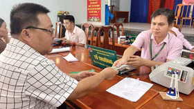 Dự thảo Nghị định quy định mức độ ưu đãi về điều kiện vay vốn cao nhất đối với nhóm khách hàng là hộ nghèo, hộ cận nghèo, hộ mới thoát nghèo và hộ dân tộc thiểu số. Ảnh: VGP