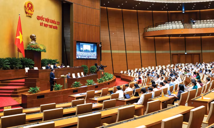 Quốc hội nghe trình bày Dự án Luật Sửa đổi, bổ sung một số điều của Luật Thương mại, Luật Cạnh tranh, Luật Quản lý ngoại thương, Luật Bảo vệ quyền lợi người tiêu dùng. Ảnh: Vũ Hiếu