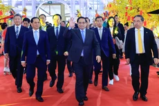 Thủ tướng Phạm Minh Chính dự lễ khai mạc Hội chợ Mùa Xuân lần thứ nhất năm 2026 với chủ đề "Kết nối thịnh vượng - Đón Xuân huy hoàng" - Ảnh: VGP/Nhật Bắc