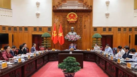 Thủ tướng Chính phủ Phạm Minh Chính chủ trì cuộc họp của Thường trực Chính phủ xem xét Đồ án quy hoạch trục đại lộ cảnh quan sông Hồng và Khu đô thị thể thao Olympic, Thủ đô Hà Nội - Ảnh: VGP/Nhật Bắc