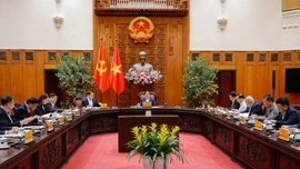 Thủ tướng Phạm Minh Chính chủ trì cuộc họp với Tổ công tác bảo đảm an ninh năng lượng - Ảnh: VGP/Nhật Bắc