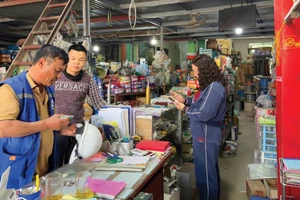 Cơ quan thuế sẽ triển khai đợt cao điểm 15 ngày hỗ trợ hộ kinh doanh đăng ký, kê khai và nộp thuế theo quy định mới. Ảnh: Tiên Giang