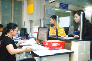 Dự thảo Nghị định được xây dựng nhằm bảo đảm quy định về phân định thẩm quyền trong đăng ký kinh doanh, cắt giảm và đơn giản hóa thủ tục đăng ký doanh nghiệp. Ảnh: Tiên Giang