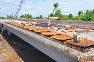 Nghị định số 210/2026/NĐ-CP tạo khung pháp lý thống nhất cho việc điều chỉnh giá hợp đồng trọn gói và hợp đồng theo đơn giá cố định. Ảnh: Song Lê