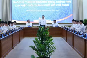 Phó Thủ tướng Thường trực Chính phủ Phạm Gia Túc làm việc với TPHCM - Ảnh: VGP/Phương Nguyên