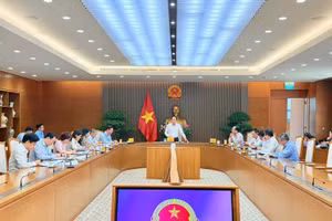 Phó Thủ tướng Lê Tiến Châu chủ trì họp về Đề án phát triển một số trường đại học lớn ở vùng Đông Nam Bộ theo hướng đạt trình độ tiên tiến của nhóm các trường hàng đầu trong khu vực châu Á - Ảnh: VGP/Thu Sa