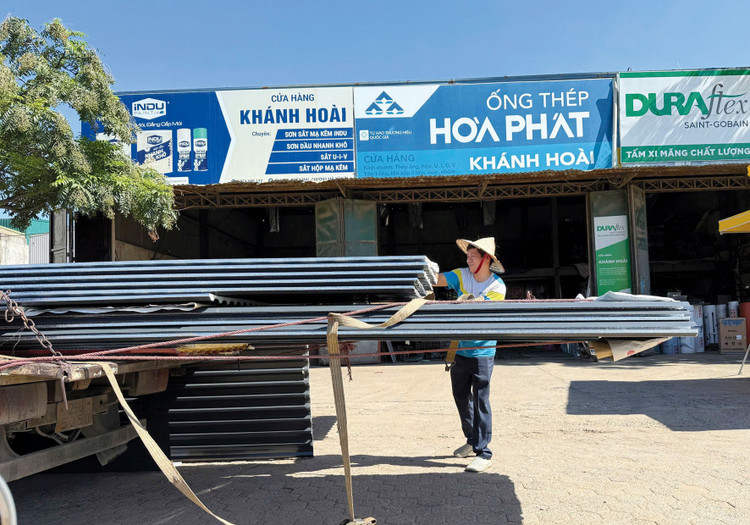 Bộ Tài chính đề xuất áp dụng thuế suất 17% cho cá nhân kinh doanh có doanh thu năm vượt ngưỡng quy định. Ảnh: Huế Nguyễn