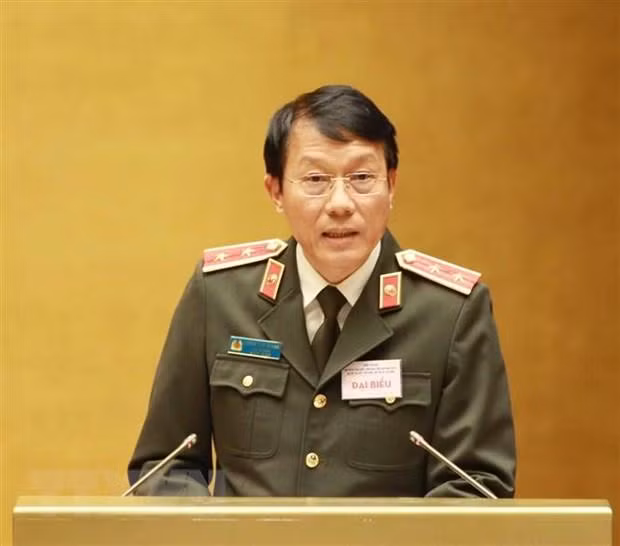 Uỷ viên Trung ương Đảng, Thứ trưởng Bộ Công an Lương Tam Quang trình bày tham luận tại hội nghị. Ảnh: TTXVN