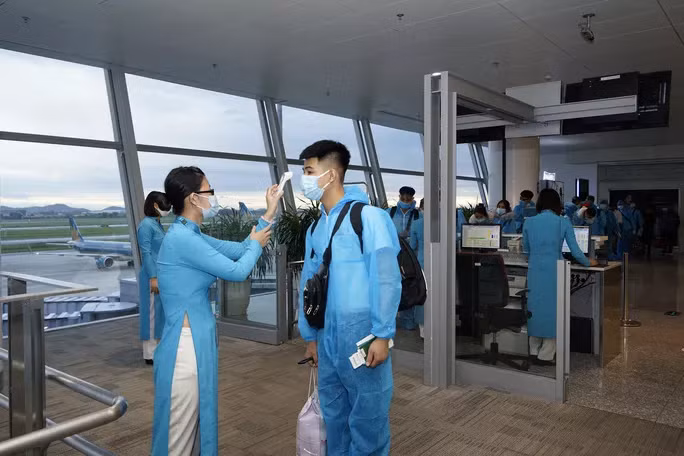 Công dân Việt Nam chuẩn bị lên một chuyến bay đi Nhật Bản vào tháng 9/2020