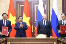 Thủ tướng Phạm Minh Chính và Thủ tướng Liên bang Nga Mikhail Mishustin chứng kiến Lễ ký kết Hiệp định về hợp tác xây dựng nhà máy điện hạt nhân trên lãnh thổ Việt Nam. (Ảnh: VGP/Nhật Bắc)