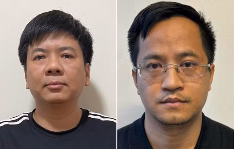 Bị can Nguyễn Ngọc Thủy (trái) và Đặng Văn Hiền.