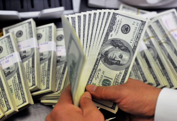 Tỷ giá trung tâm sáng ngày 27/5 ở mức 23.109 VND/USD, tăng 4 đồng so với hôm qua. Ảnh minh họa: TTXVN