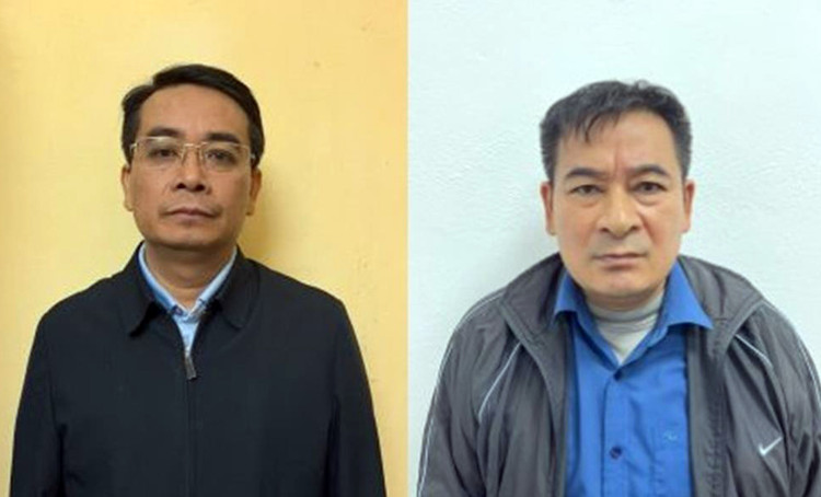 Từ trái sang: Bị can Ngô Quốc Trưởng và bị can Đoàn Việt Hưng.