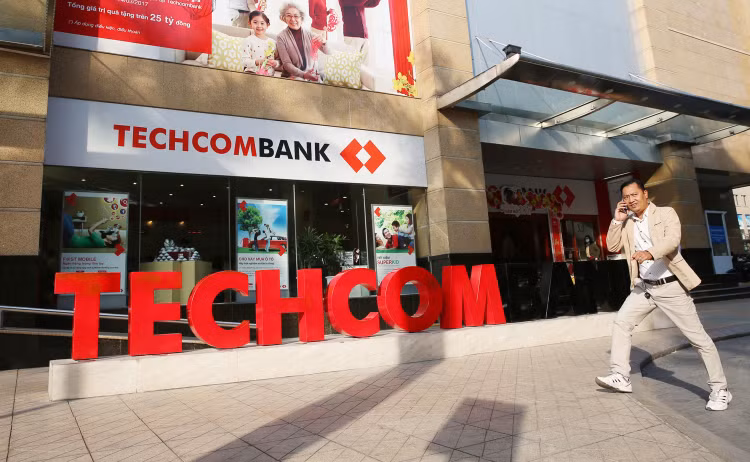Tính đến ngày 24/9, đã có 11 ngân hàng thương mại đã được Thống đốc NHNN có quyết định áp dụng Thông tư 41 trước thời hạn. Ảnh: Lê Tiên