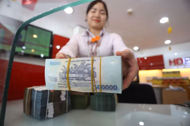 Mặt bằng lãi suất có xu hướng nhích lên trong năm 2018, rõ nét nhất ở lãi suất huy động. Ảnh: Tâm An