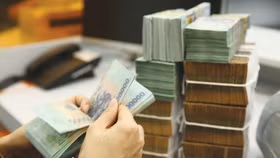 Tính đến ngày 30/9/2026, dư nợ toàn nền kinh tế đạt khoảng 20,75 triệu tỷ đồng, tăng 11,59% so với cuối năm 2025 và tăng 16,69% so với cùng kỳ năm 2025. Ảnh: Gia Khoa