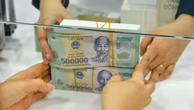 Ngân hàng Nhà nước đề xuất điều chỉnh quy định về nhận biết khách hàng và tiêu chí xác định chủ sở hữu hưởng lợi để tăng cường minh bạch và phòng, chống rửa tiền. Ảnh: Nhã Chi