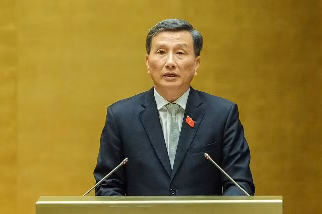 Chủ nhiệm Ủy ban Khoa học, Công nghệ và Môi trường Lê Quang Huy trình bày báo cáo thẩm tra. Ảnh: Quốc hội