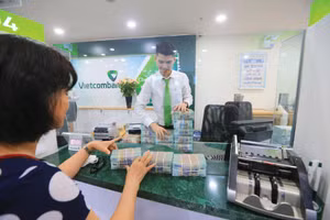 Ngành ngân hàng chủ động bố trí nguồn vốn quy mô lớn để đồng hành, chia sẻ và trợ lực cho cộng đồng doanh nghiệp nhỏ và vừa. Ảnh: Ngọc Thắng