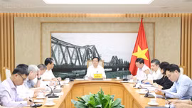 Phó Thủ tướng Hồ Quốc Dũng chủ trì cuộc họp với các bộ, cơ quan liên quan về hoàn thiện hồ sơ Dự án Luật Đất đai (sửa đổi) - Ảnh: chinhphu.vn/Gia Huy