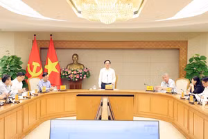Phó Thủ tướng Hồ Quốc Dũng chủ trì cuộc họp với các bộ, cơ quan liên quan về dự án Luật Đất đai (sửa đổi) - Ảnh: chinhphu.vn/Gia Huy